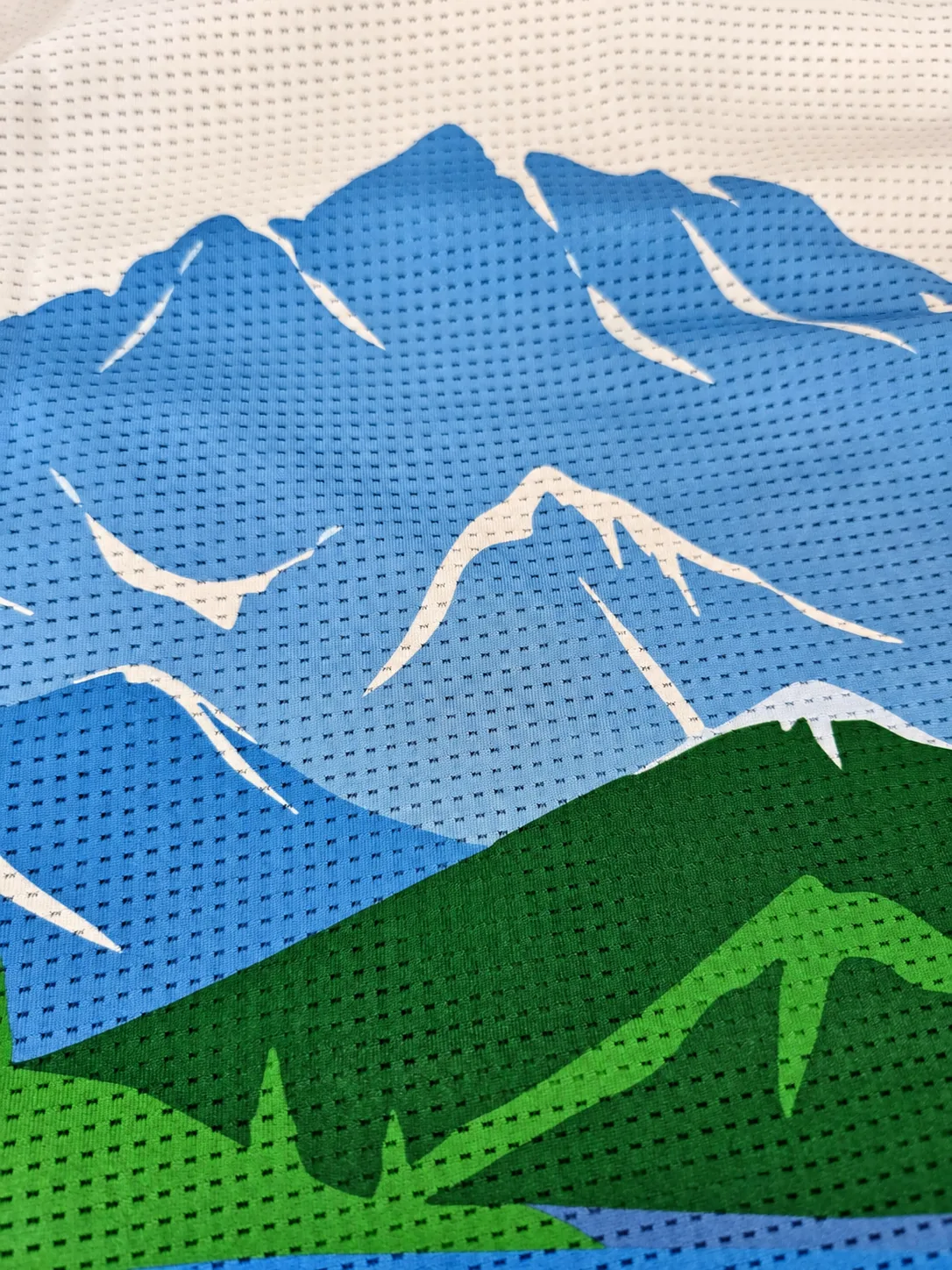 Full-color print on the mesh fabric of a trail t-shirt