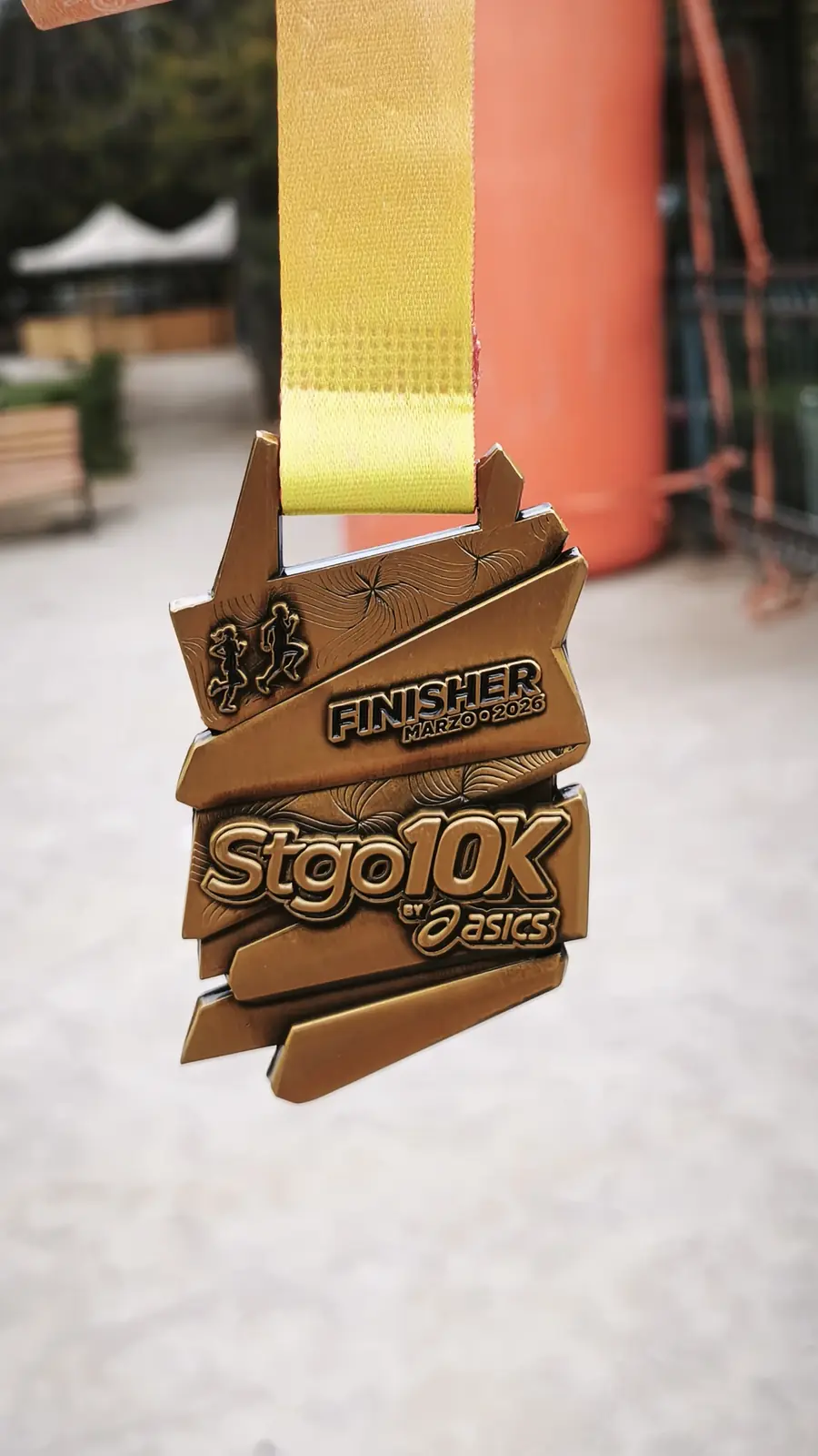 STGO 10K finisher medal in a bronze finish